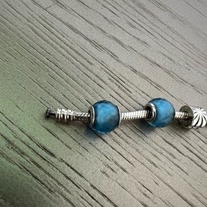 Two Pandora crystal charms (blue charms only- bracelet not included)